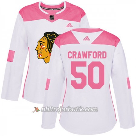 Dame Ishockey Chicago Blackhawks Tröja Corey Crawford 50 Adidas 2017-2018 Vit Rosa Fashion Authentic Dame Ishockey Chicago Blackhawks Tröja Corey Crawford 50 Adidas 2017-2018 Vit Rosa Fashion Authentic